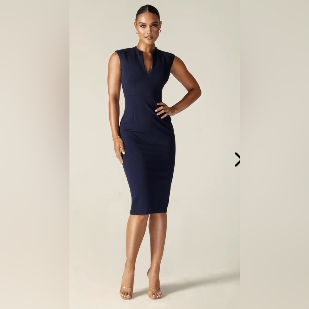 Alieva Lianna deep slit neckline dress.